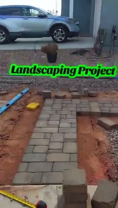Fresh paver walkway installation by Phillip's Landscaping in front of an Arizona home